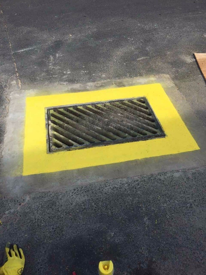 new drain with yellow paint