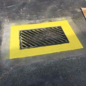 new drain with yellow paint